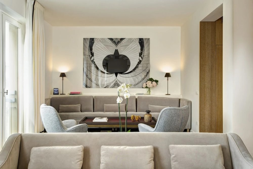 Stylish living area at Hotel Lungarno overlooking Florence rooftops