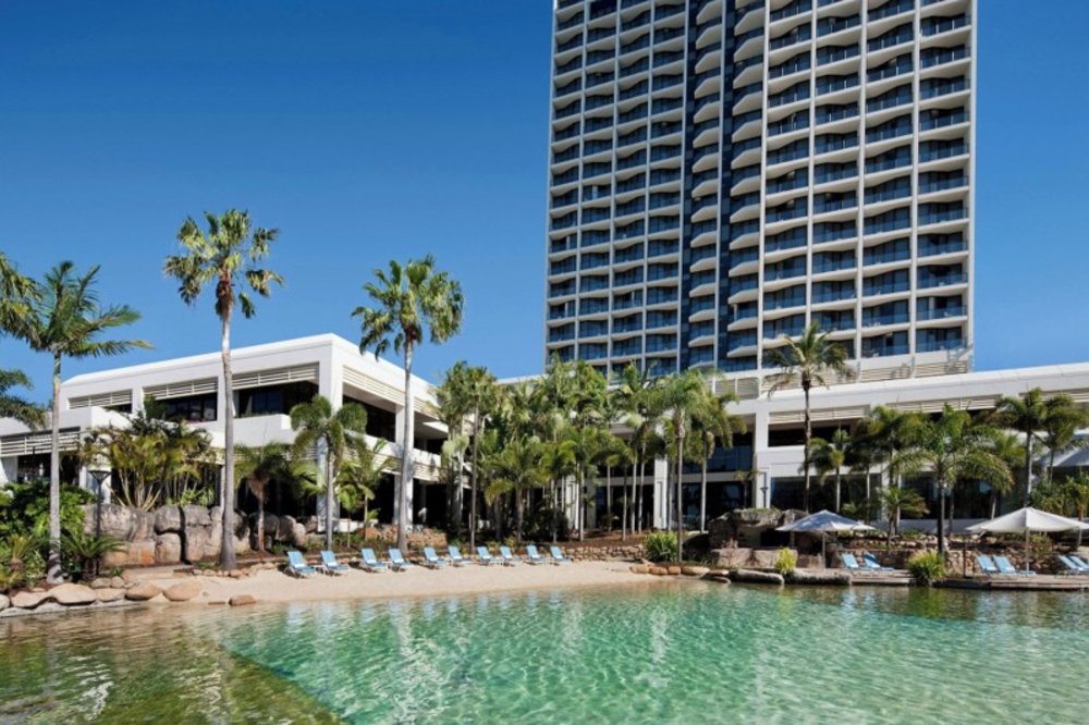 A tall building by a bay