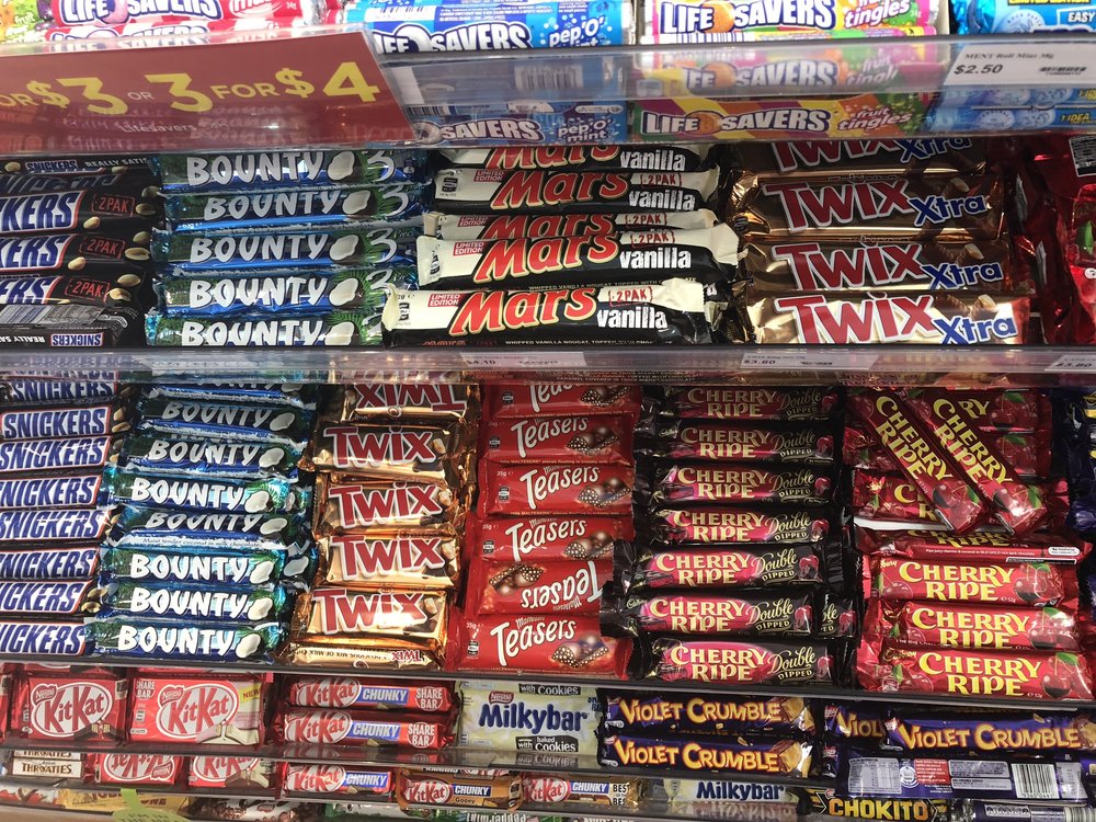 Assorted chocolate bars and sweets commonly found in the United Kingdom
