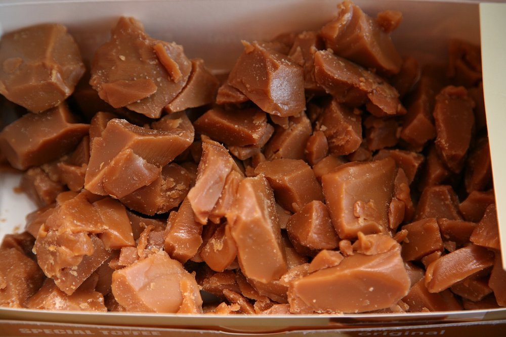 Chunks of classic British fudge displayed in a box