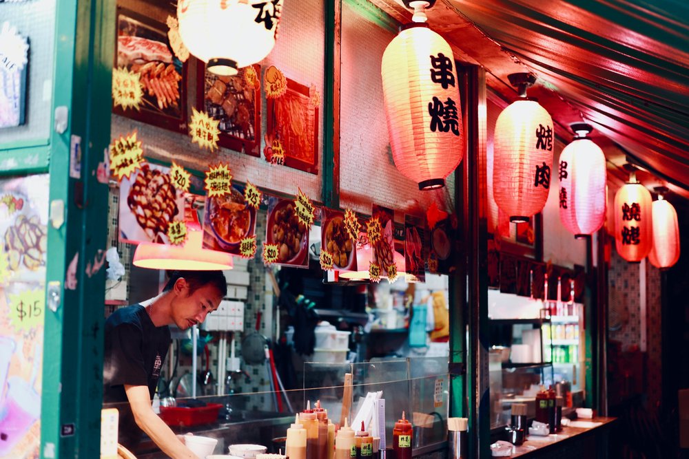 Street food vendor with lanterns serving affordable meals in Sydney