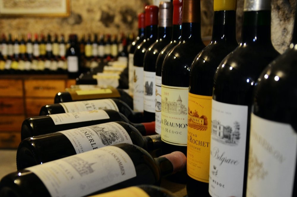 Wine bottles displayed inside Musée du Vin et du Négoce