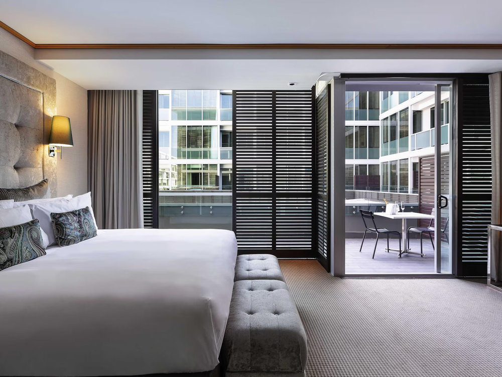 Luxury hotel room at Sofitel Auckland Viaduct Harbour with elegant interior