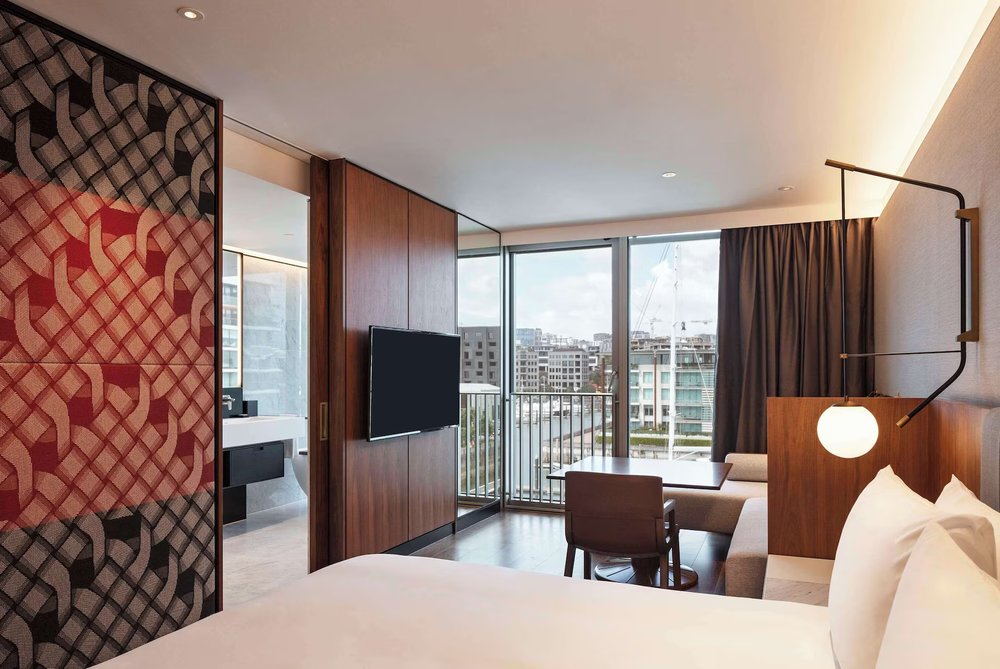 Park Hyatt Auckland room with large windows and views of the waterfront
