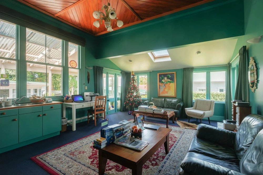 Interior of The Great Ponsonby ArtHotel featuring vintage decor and warm, home-style seating