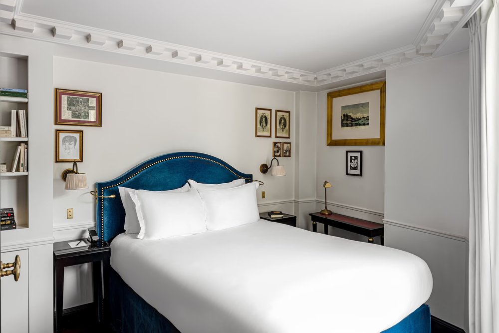 Modern guest room at La Chambre du Marais with elegant decor and a calm boutique hotel feel