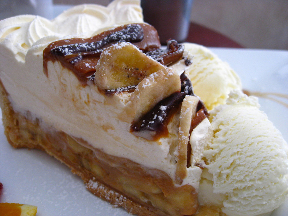 Banoffee pie with banana, toffee, and whipped cream