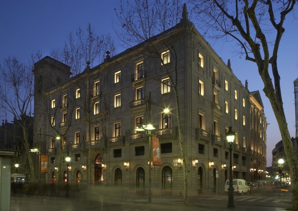 Hotel 1898 exterior at night located on La Rambla in Barcelona