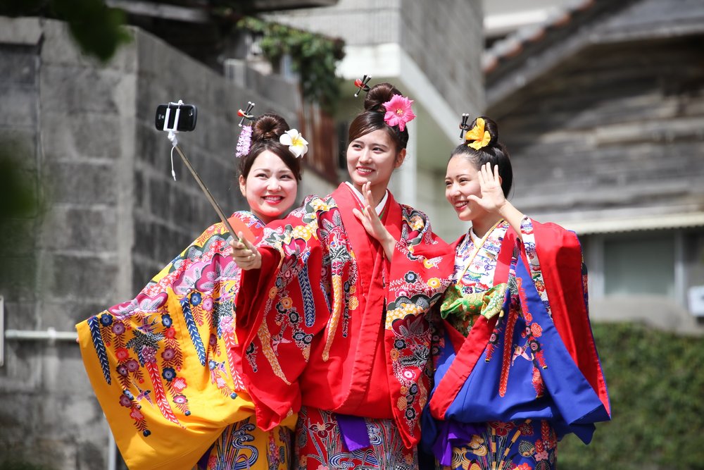 Tourists wearing traditional Ryukyu clothing in Naha