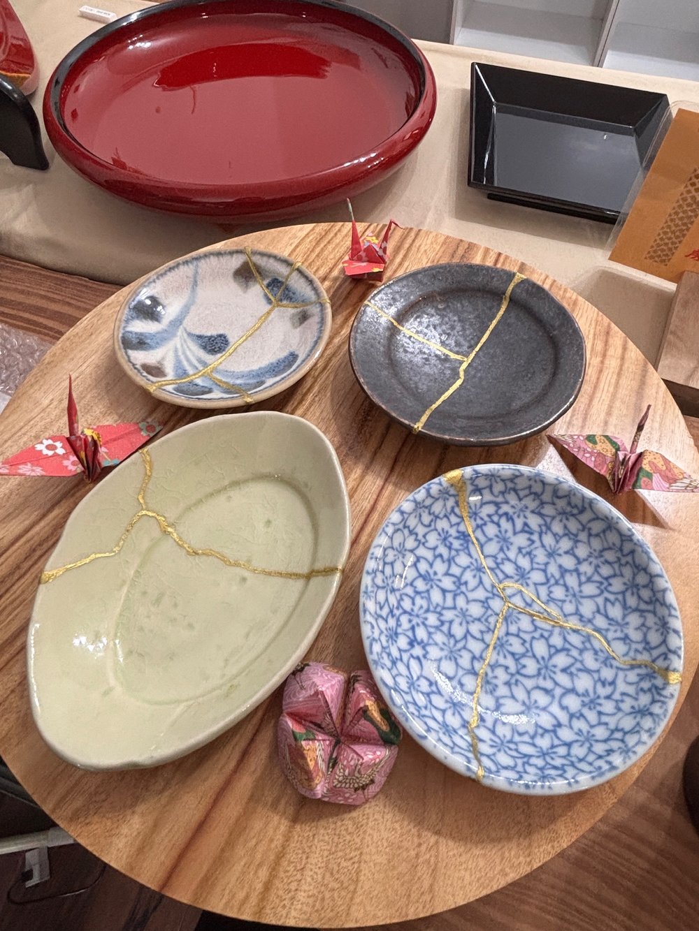 Handcrafted kintsugi pottery repaired with gold lines