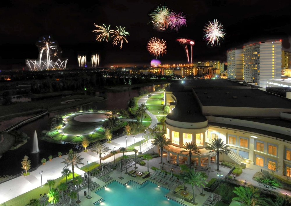 Waldorf Astoria Orlando at night with fireworks display