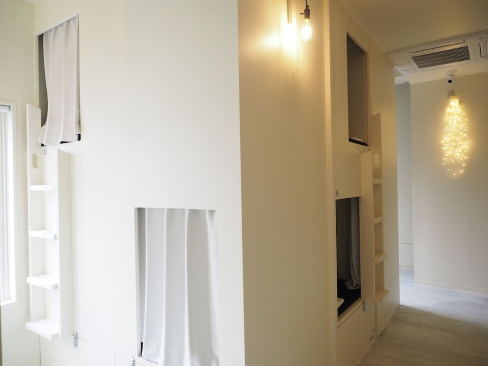 Minimalist bunk beds at Almond Hostel & Cafe Shibuya