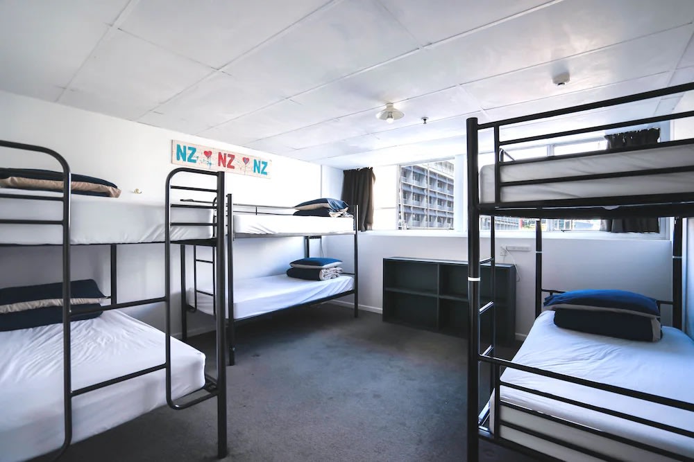 Guest check-in at The Attic Backpackers Auckland with a friendly reception