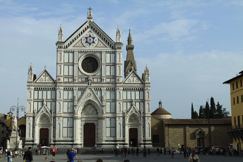 Facade of the Basilica of Santa Croce in Florence, showcasing Gothic architecture and intricate details