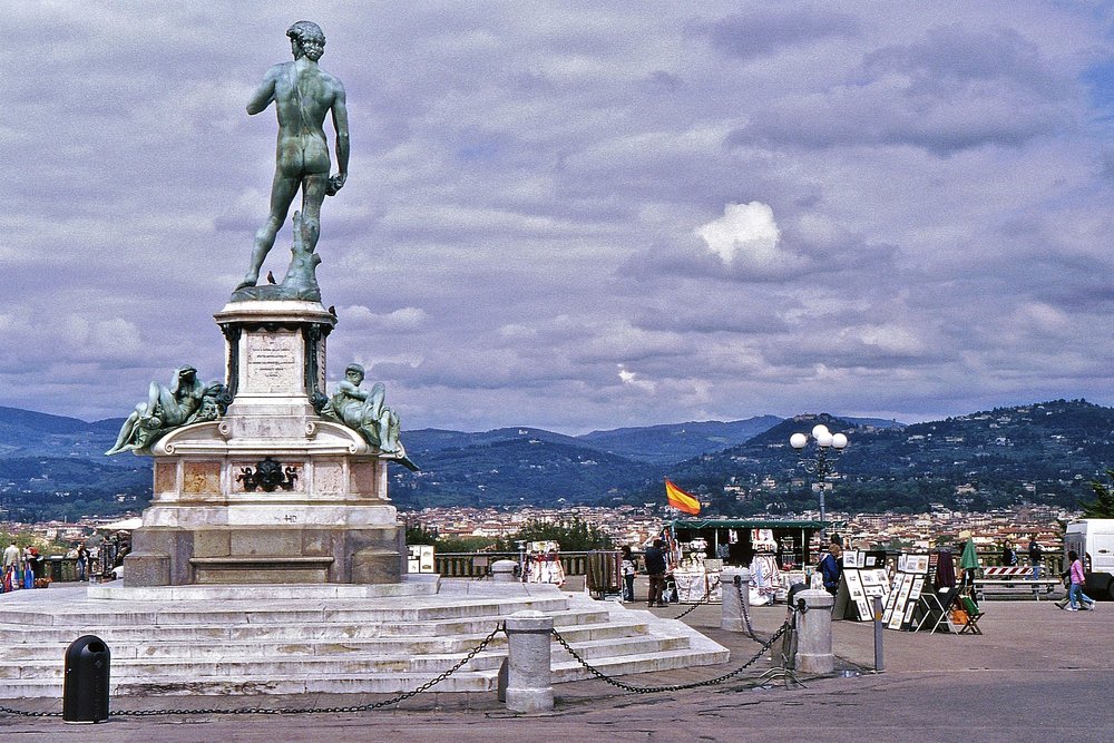 Bronze statue of David at Piazzale Michelangelo with panoramic Florence backdrop