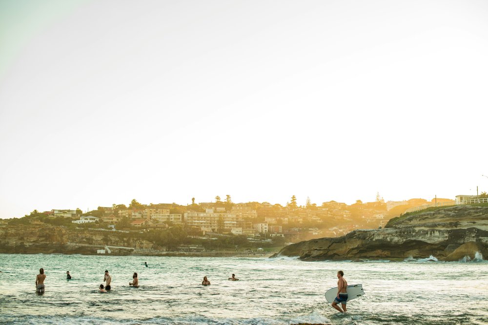 Tourists swimming at the beach in Australia