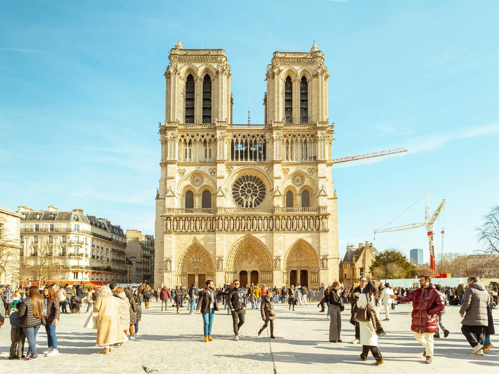 Notre-Dame Cathedral with tourists in Paris