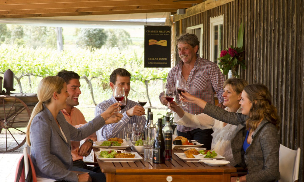 Group enjoying wine tasting lunch at Barossa Valley vineyard