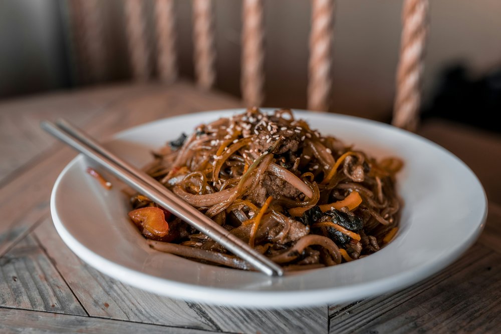 Stir-fried glass noodles with vegetables and beef | Photo Credit: GoodEats YQR on Unsplash