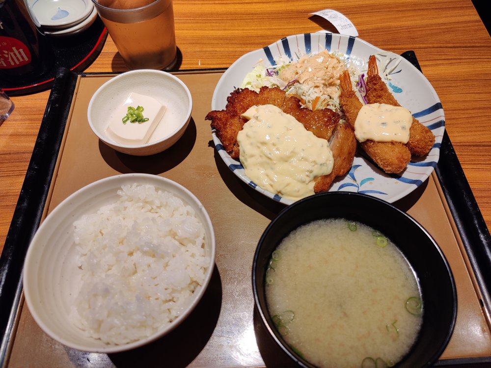 A typical Japanese meal with soup, rice, and fried food
