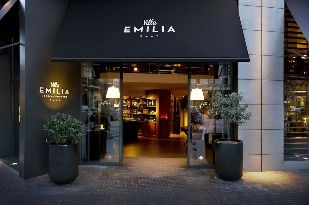 Entrance of Hotel Villa Emilia in Barcelona with stylish modern facade