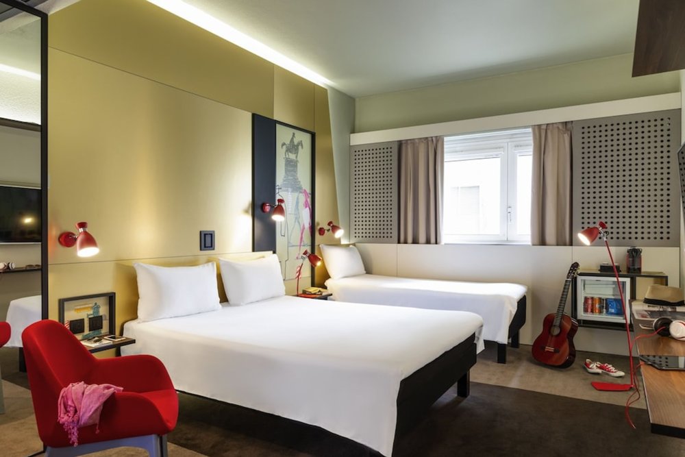 Bright twin room with modern design at Ibis Milano Centro Milan