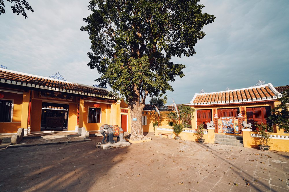 Yellow traditional buildings and courtyard in Hoi An, Vietnam