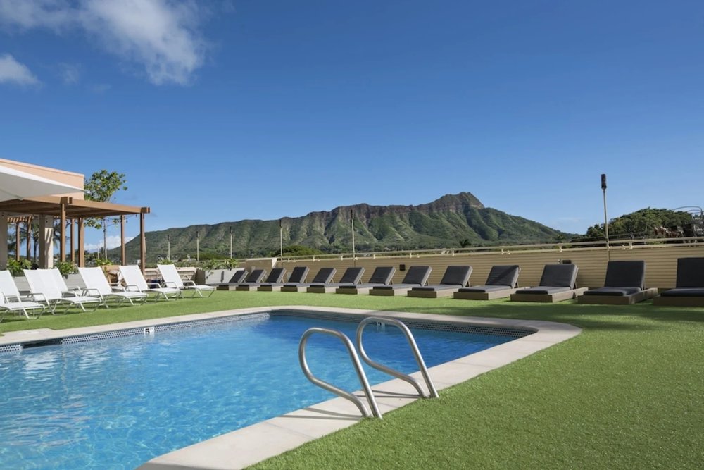 Rooftop pool at Queen Kapiolani Hotel with Diamond Head views