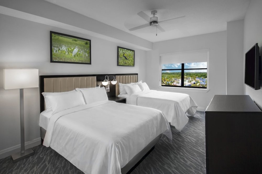 Bright family suite with two beds at The Grove Resort Orlando