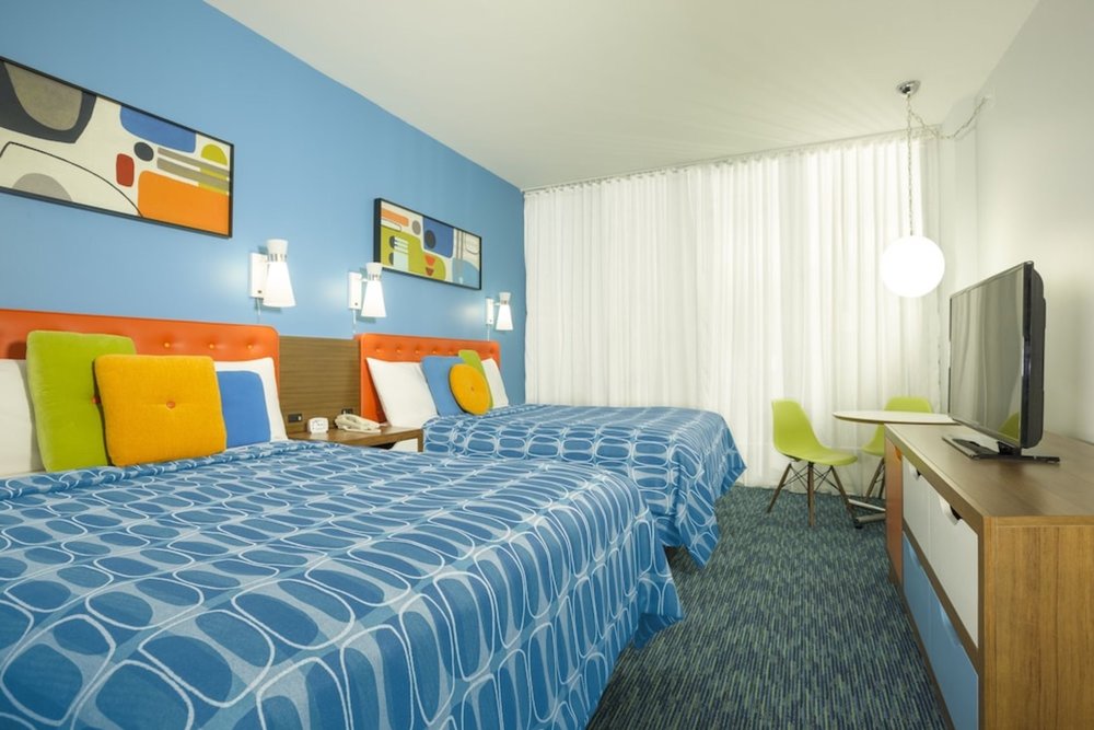 Colorful double queen room at Cabana Bay Beach Resort Orlando