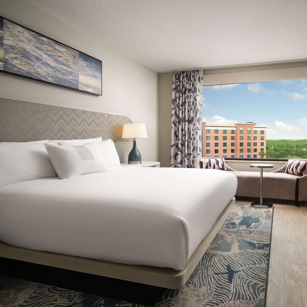 Modern king room with window seating at Caribe Royale Orlando