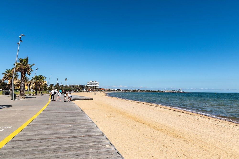 St Kilda Beach boardwalk and coastline under clear blue skies in Melbourne