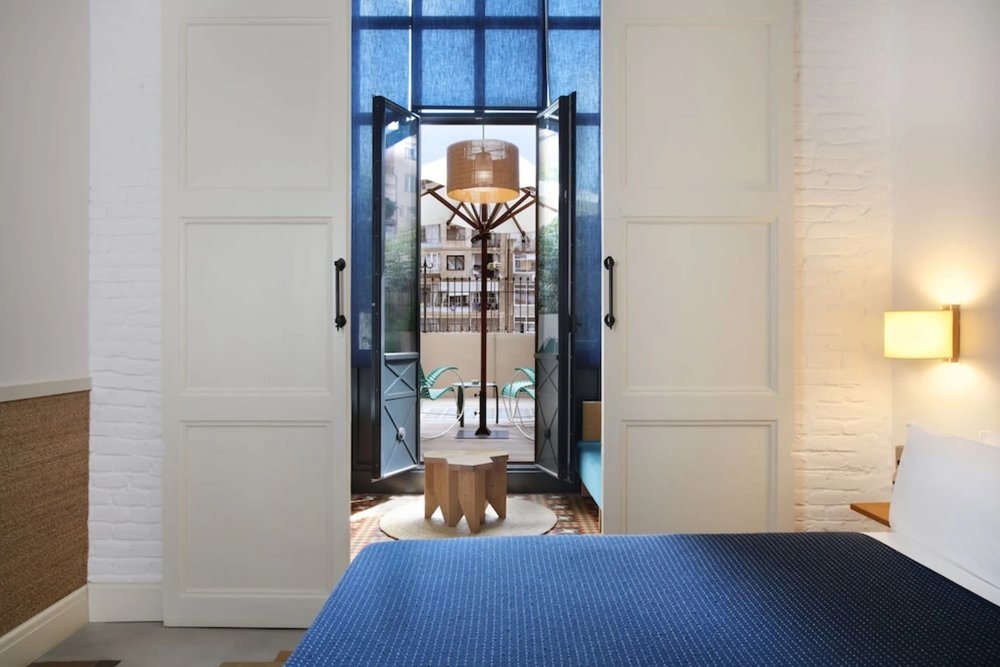 Casa Bonay Barcelona room with balcony doors and chic boutique design
