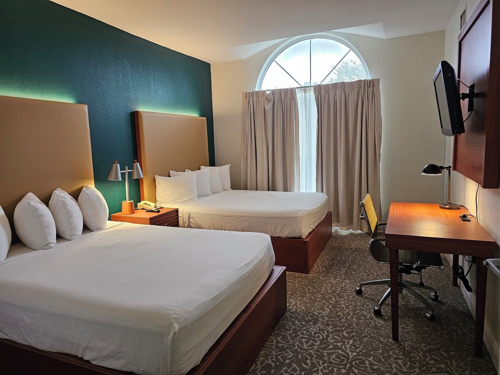 Cozy room at Montreal Suites with a comfortable bed and soft linens