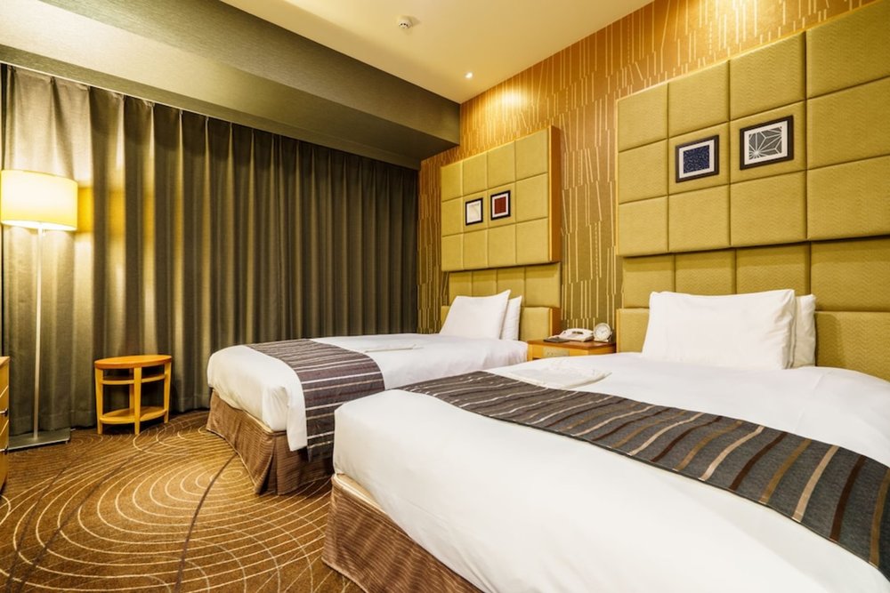 Cozy double beds at the Sotetsu Fresa Inn Higashi-Shinjuku