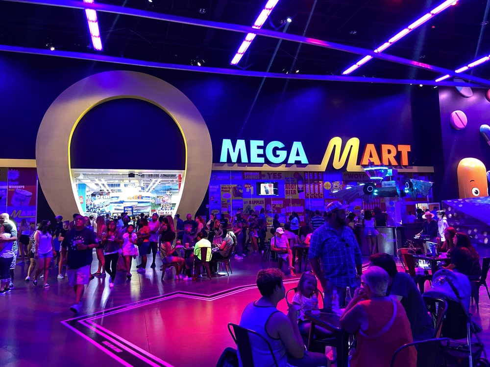  Visitors exploring the colorful and futuristic interior of AREA15 in Las Vegas | Photo Credit: Wikimedia Commons