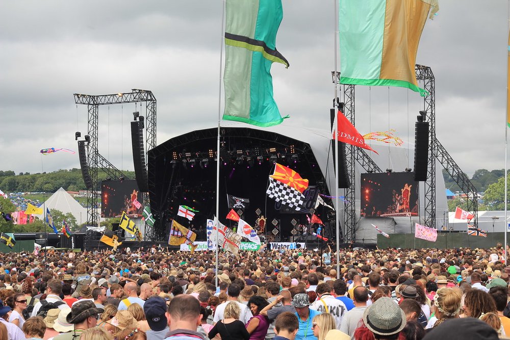  The main stage at Glastonbury, packed with fans enjoying live performances | Photo Credit: Flickr