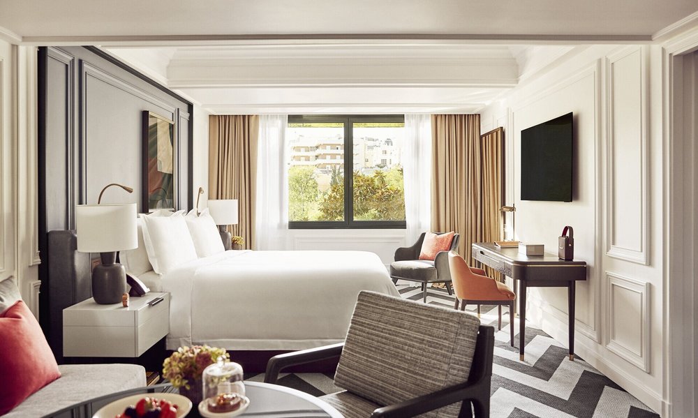 Spacious and luxurious suite at Rosewood Villa Magna with light-filled decor