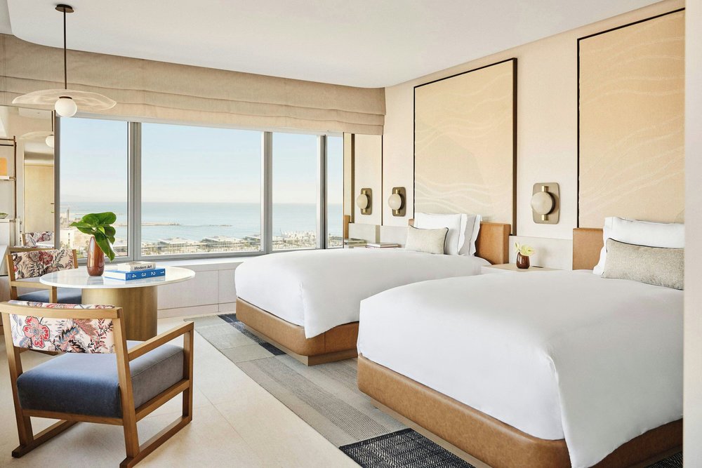 Elegant room at Hotel Arts Barcelona with panoramic views of the city and sea