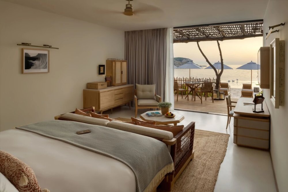 Serene room with beachfront view and minimalist design at Six Senses Ibiza