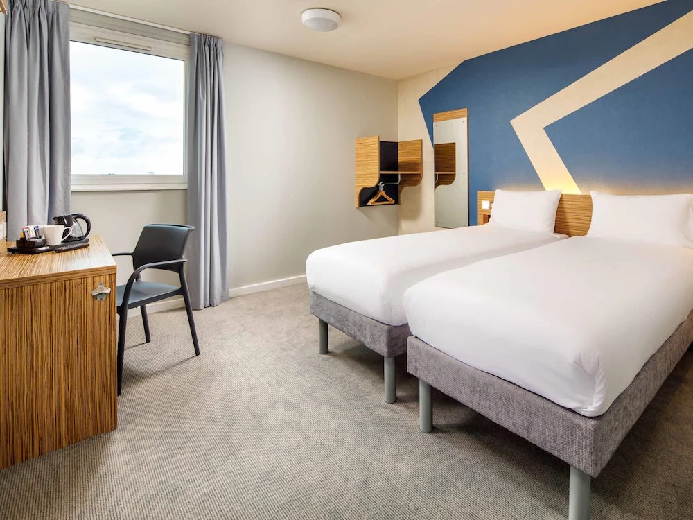 Cozy, budget-friendly hotel room at Ibis Budget London Heathrow with basic amenities