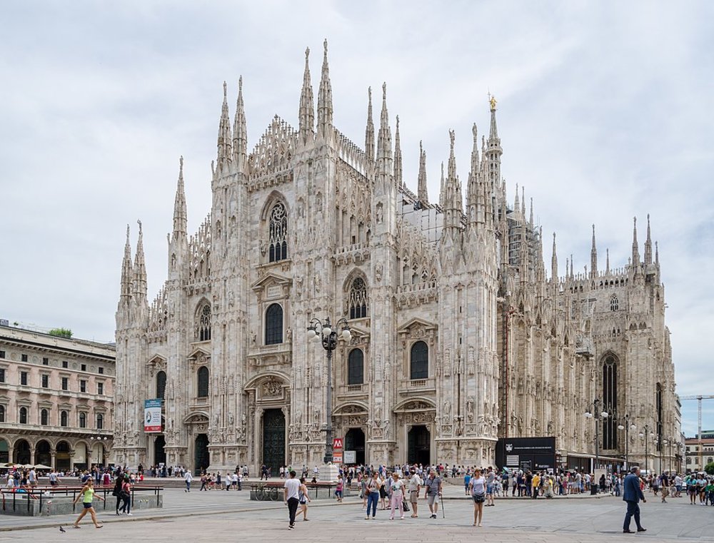 Duomo di Milano with its intricate Gothic architecture and bustling square