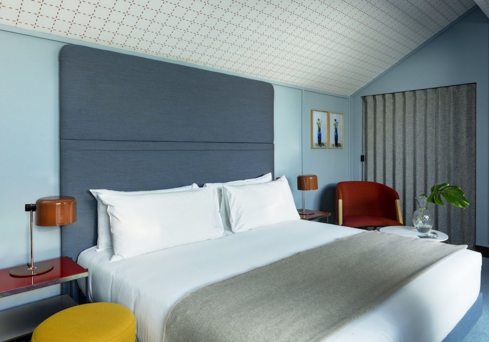 Contemporary room at Room Mate Giulia Milan with bold design and luxury comfort