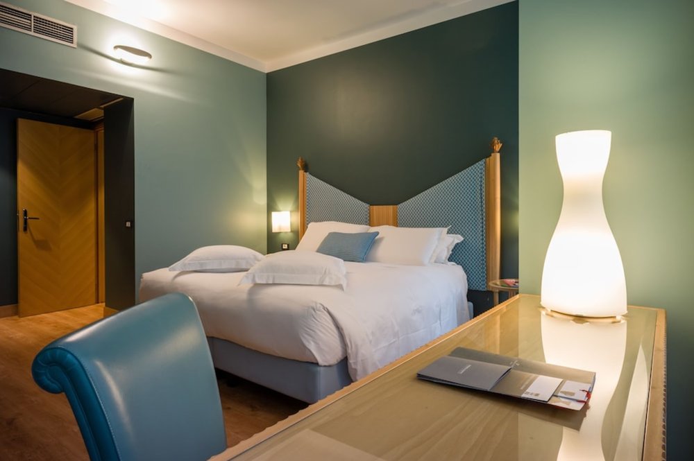 Elegant guest room at Hotel Spadari al Duomo with chic interiors near Milan Cathedral