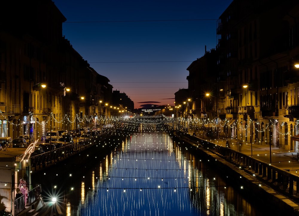 Navigli canals at night, with lights and reflections in Milan's trendy district