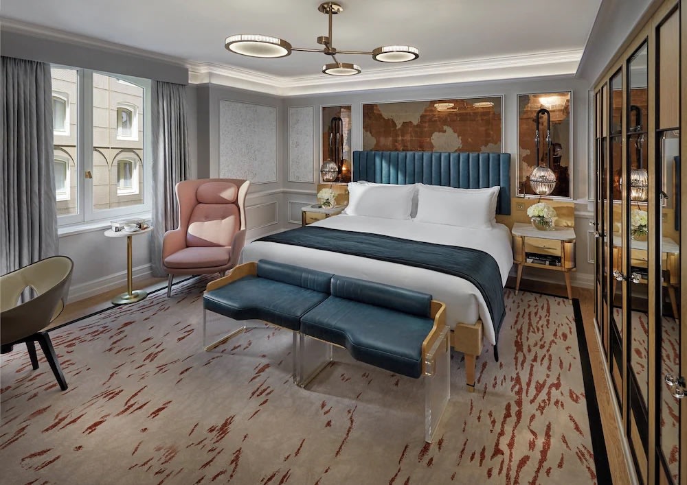 Stylish room at Mandarin Oriental, London, with modern design and plush bedding