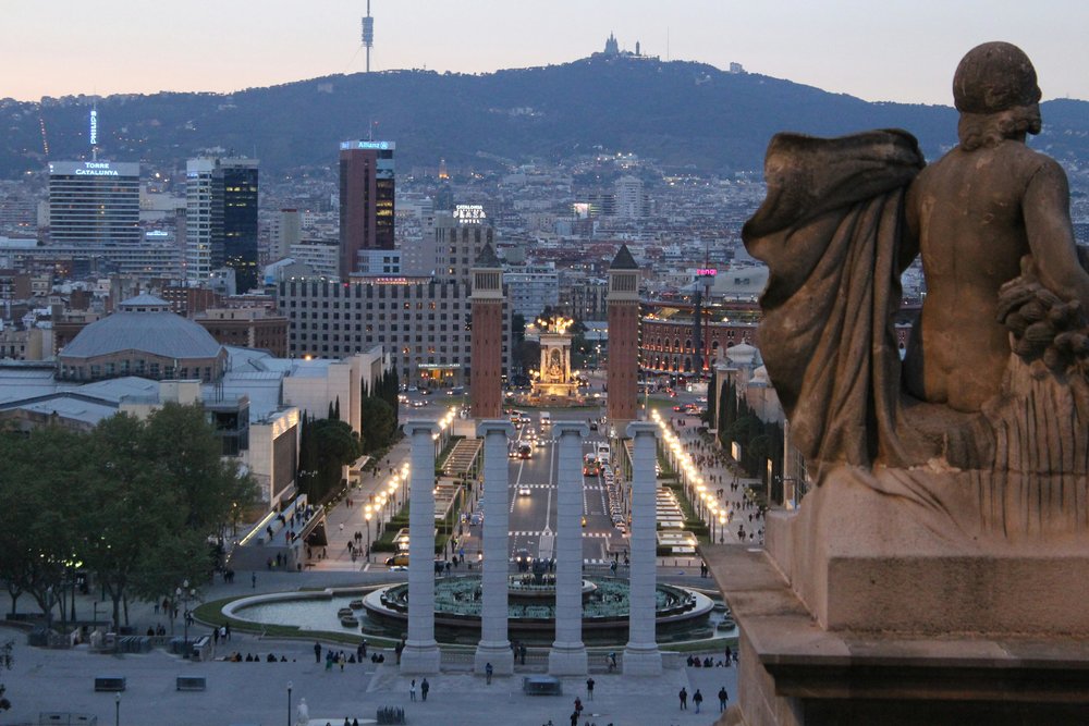 View from Montjuïc hill toward Plaça d’Espanya and city skyline in Barcelona