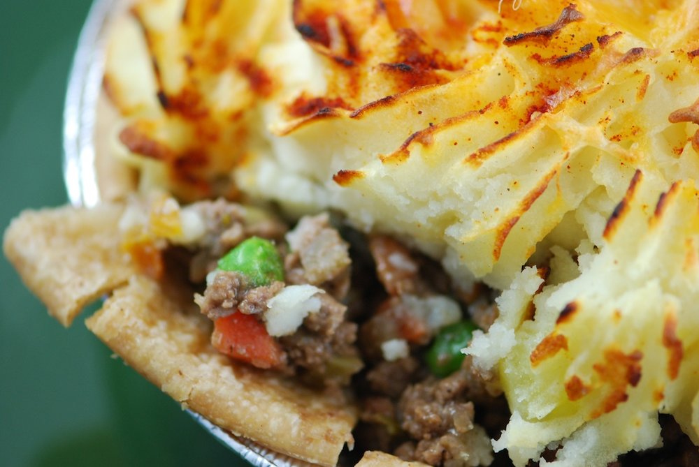 Close-up of shepherd's pie with beef, vegetables, and mashed potato crust