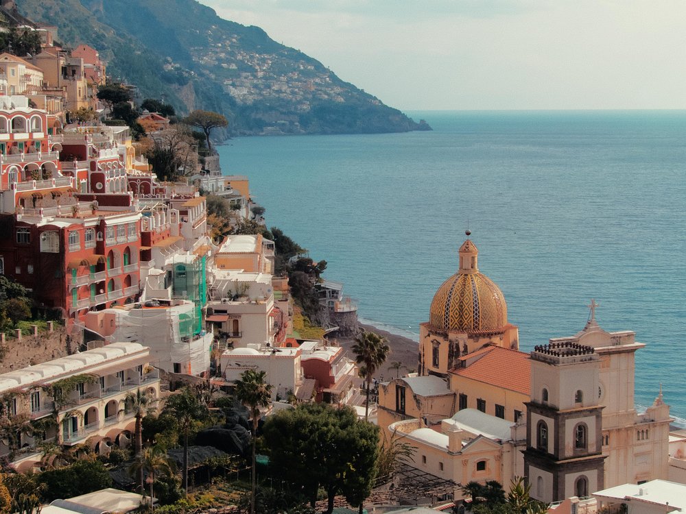 Vibrant Amalfi Coast coastline with colorful homes and sparkling blue waters