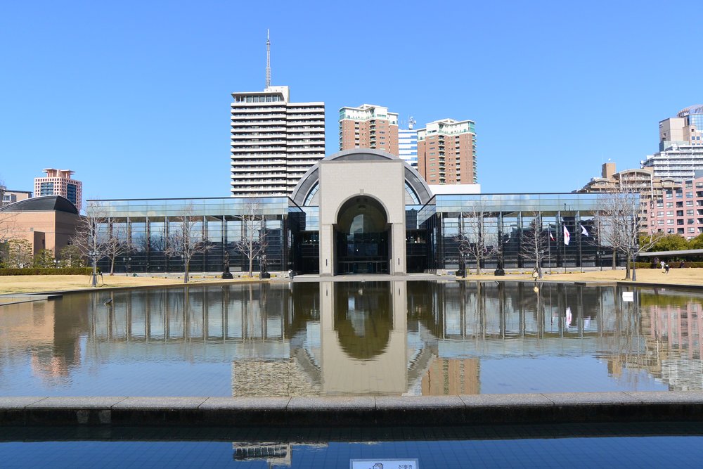 Exterior view of Fukuoka City Museum with its reflecting pool and modern architecture